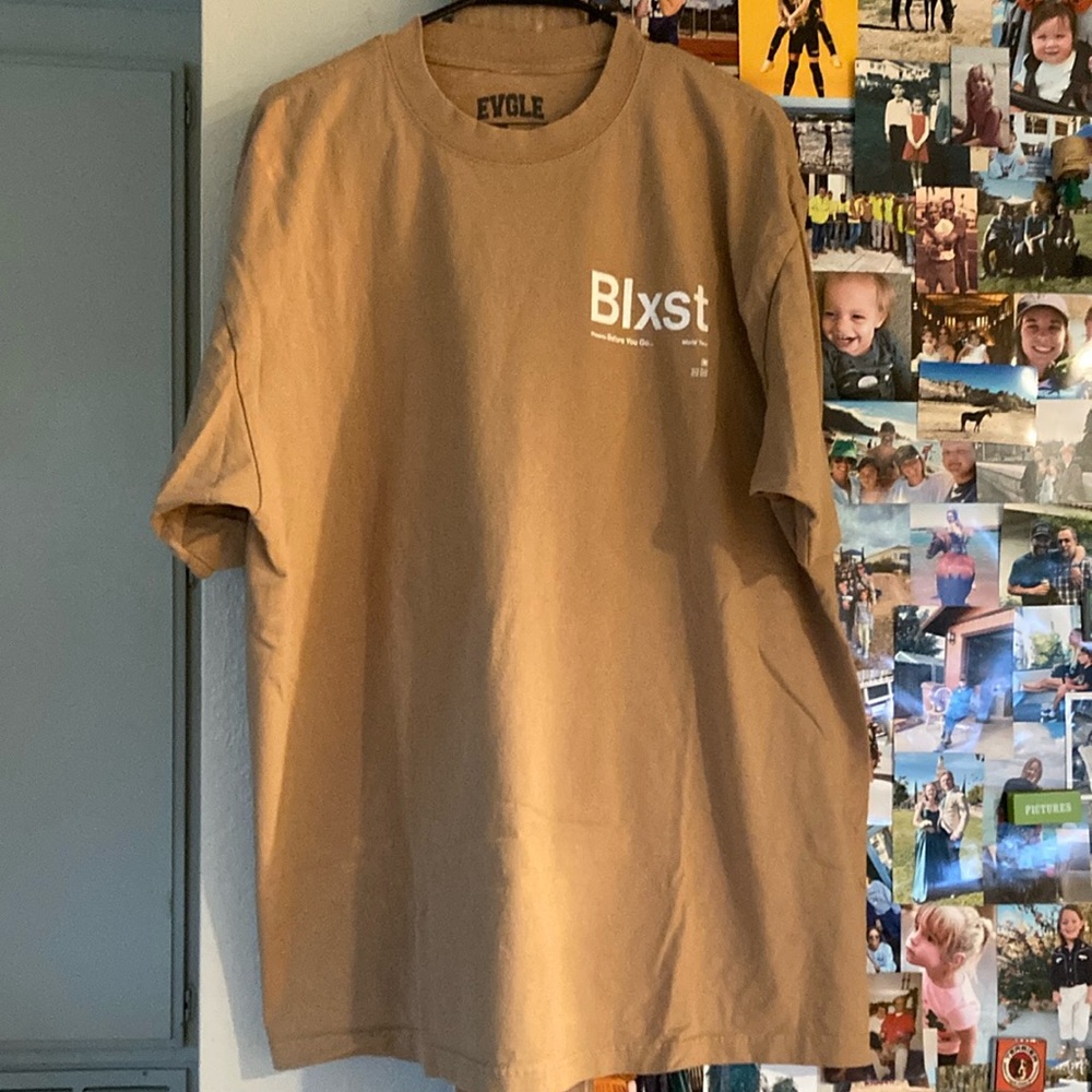 BLXST concert t-shirt.